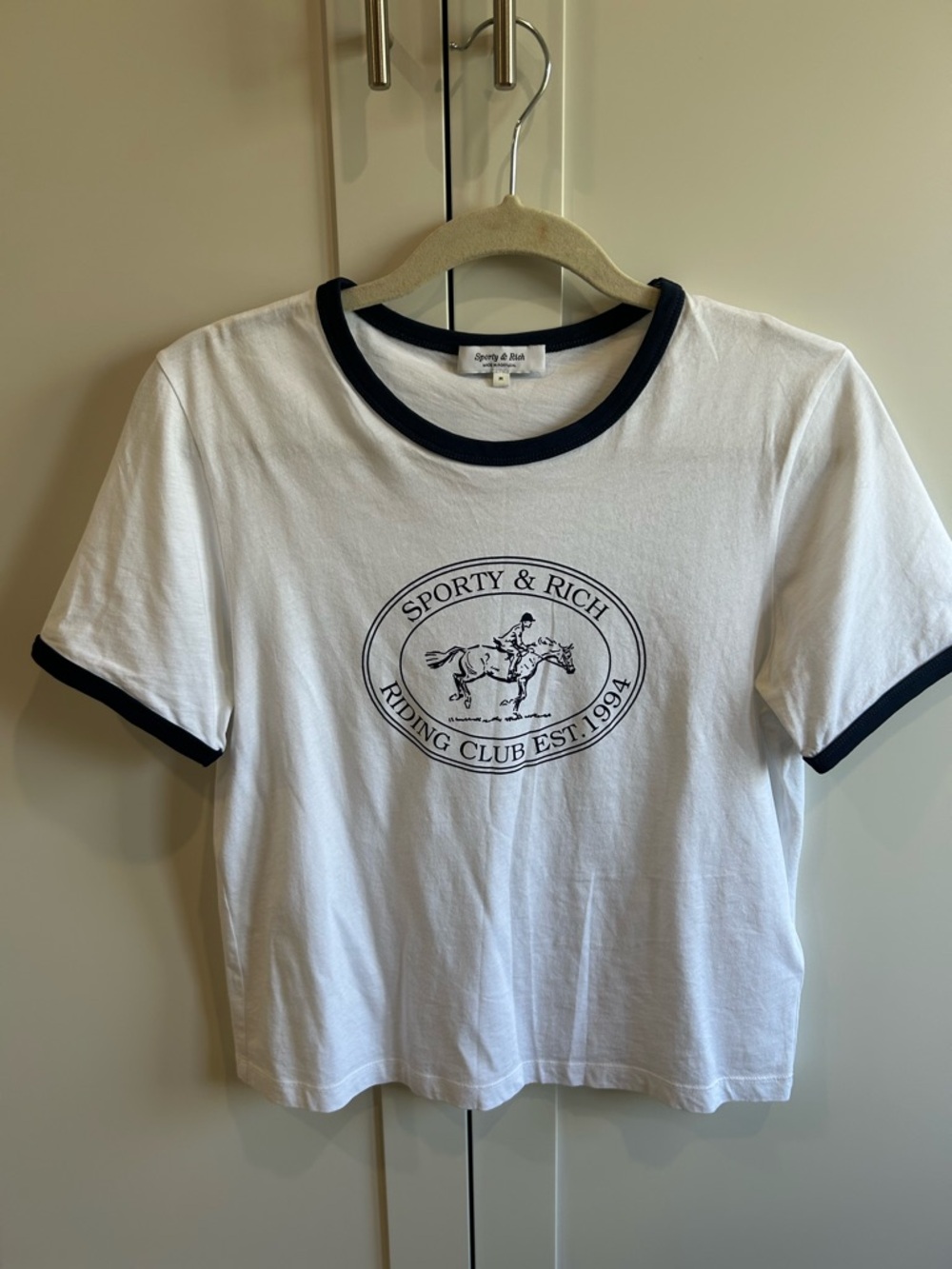 Sporty & Rich White Tee with Black Trim and Logo